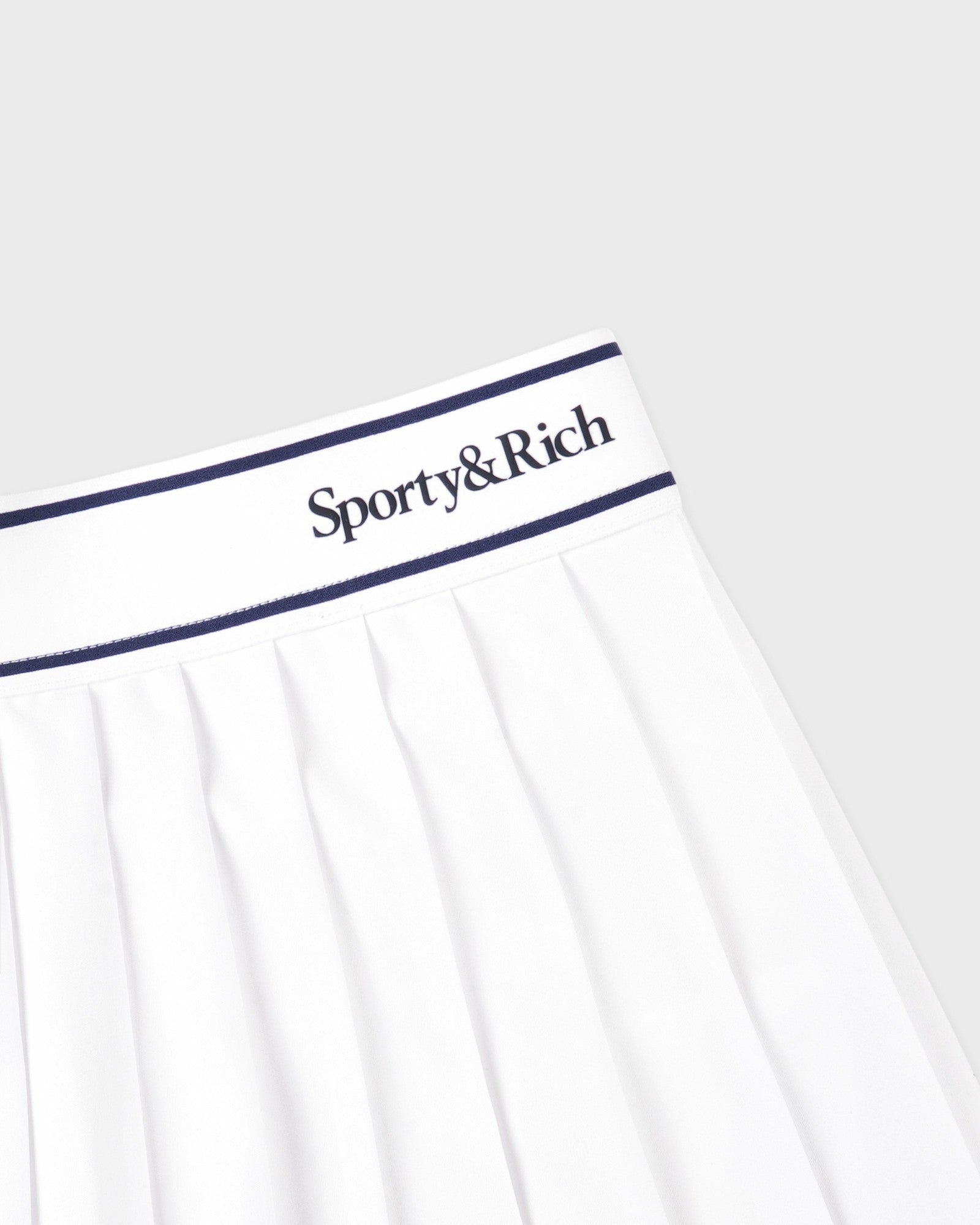 Serif Logo Pleated Skirt - White/Navy Sporty & Rich Online