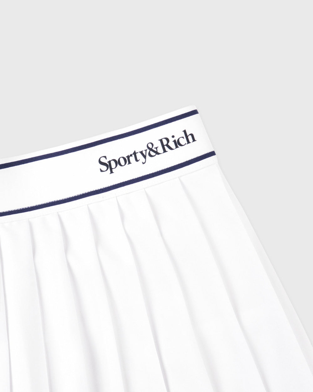 Serif Logo Pleated Skirt - White/Navy Sporty & Rich Online